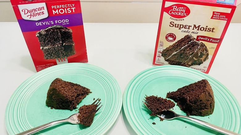 Slices of Duncan Hines and Betty Crocker cakes with forks