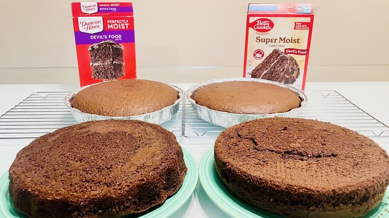 Round pans of Duncan Hines and Betty Crocker Devil's Food cake mixes