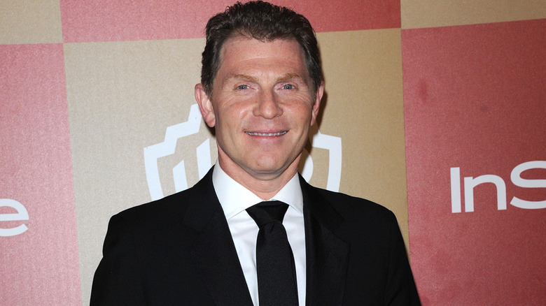 Bobby Flay smiling at event