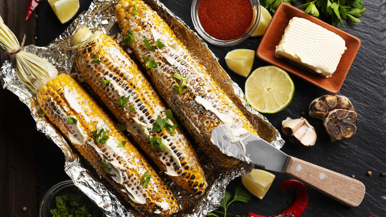 Grilled corn with butter and other ingredients