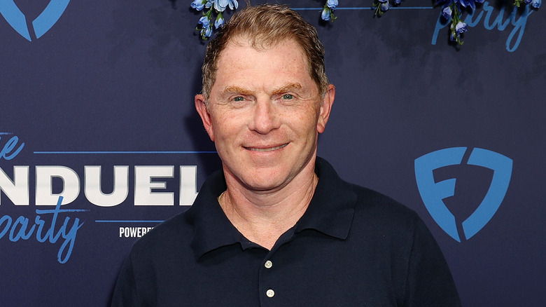 Bobby Flay smiling on 2024 FanDuel red carpet