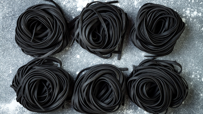 squid ink fettuccini in nests