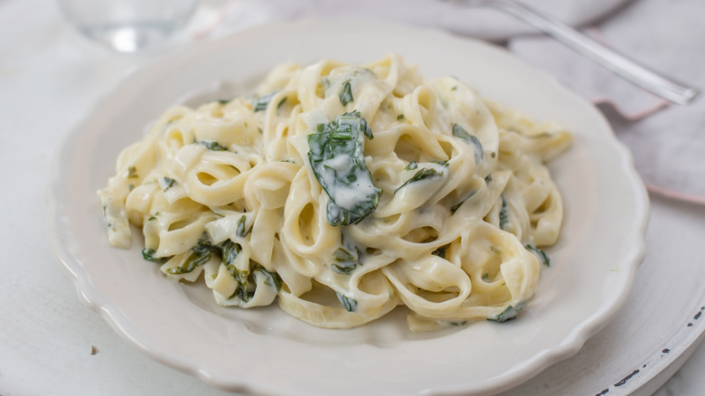 Tagliatelle with creamy garlic and herb sauce