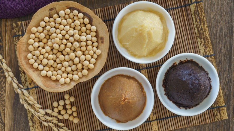 Three different bowls of miso paste