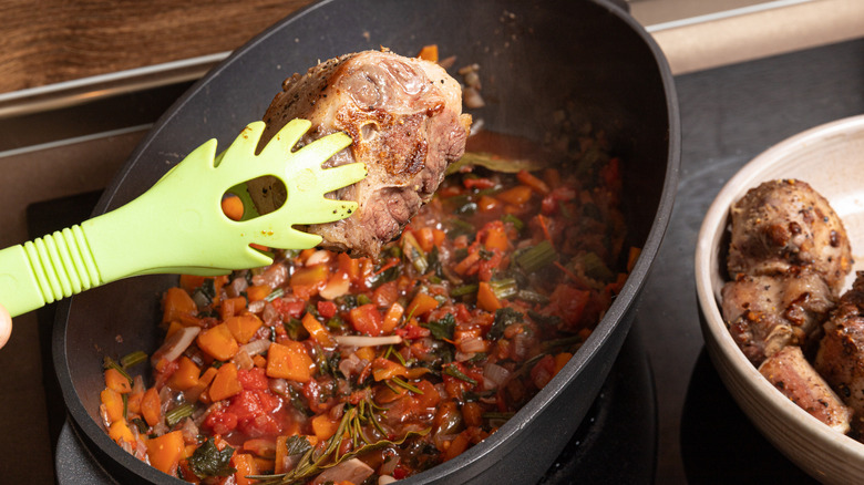 adding oxtails to braising liquid