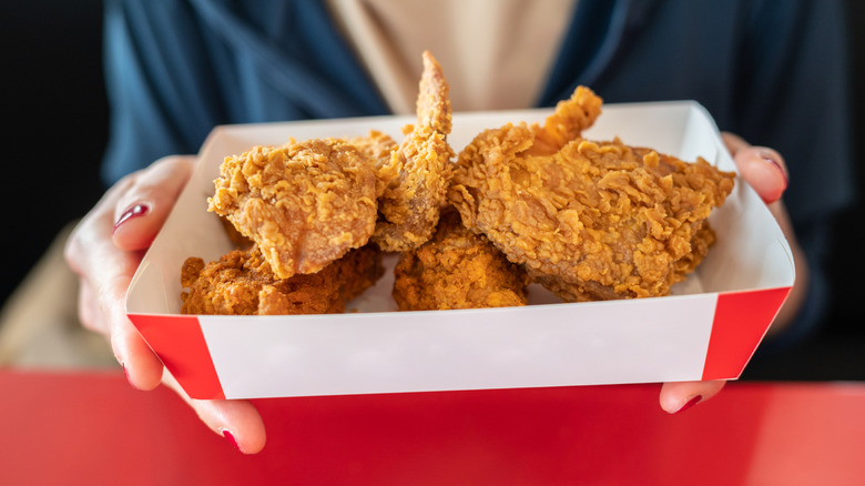 Food food chicken pieces in paper tray