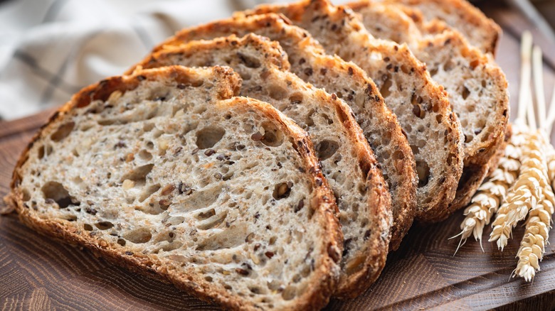 slices of seeded wheat bread arranged in a row