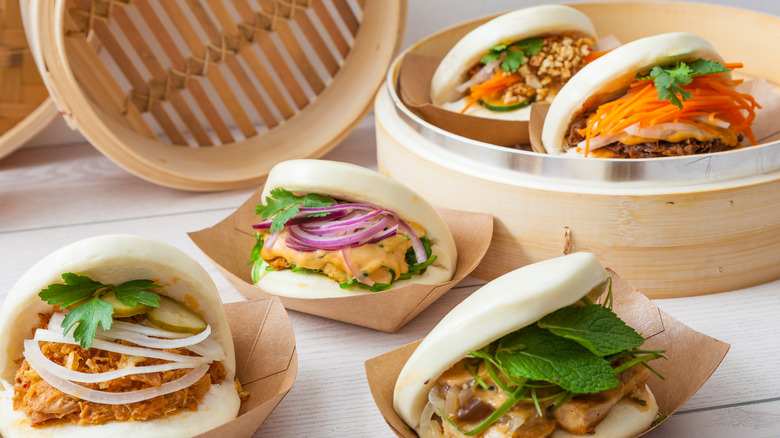 Filled bao buns in paper containers