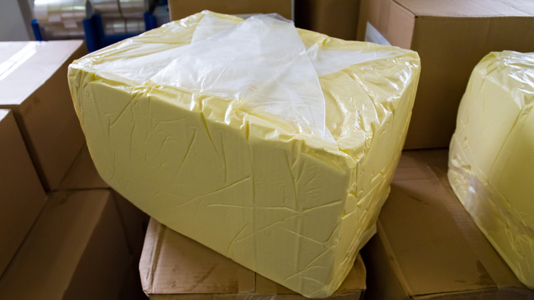 plastic-wrapped block of butter 
