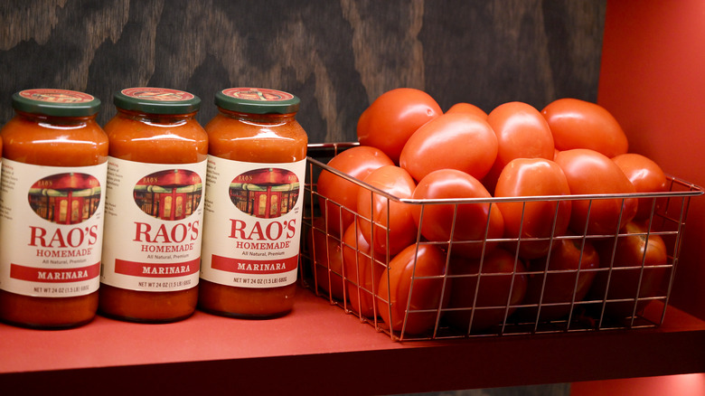 rao's pasta sauce next to basket of tomatoes