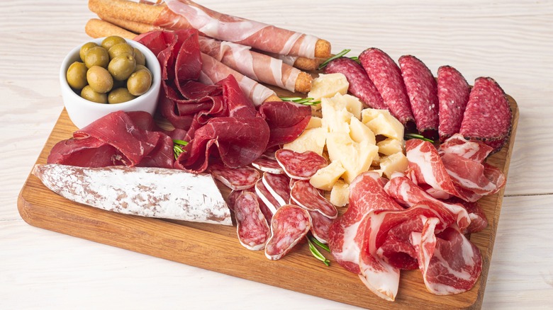 charcuterie board with cured meats