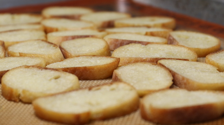 golden baguette slices on tray