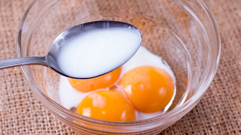 making eggs with a spoonful of evaporated milk