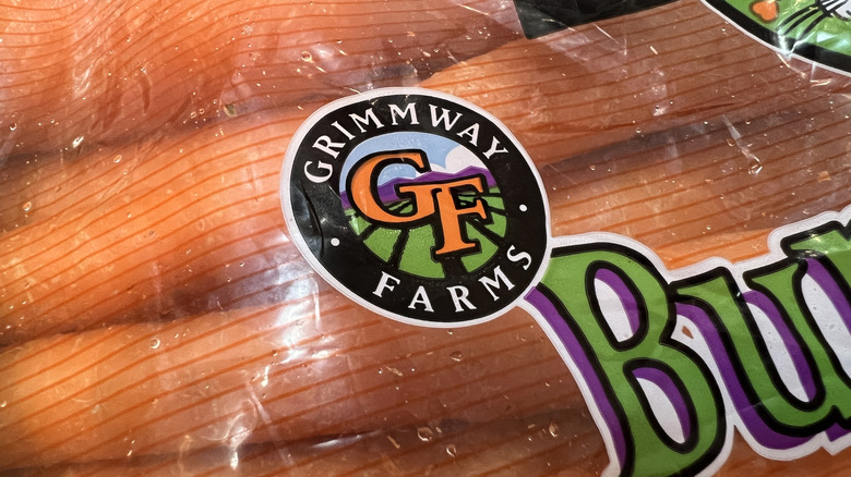 Plastic bag full of carrots with the Grimmway Farms logo