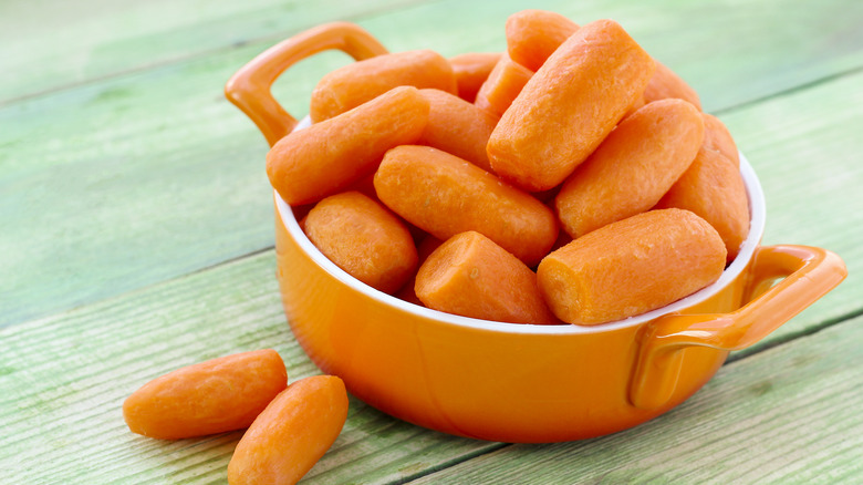 small bowl of baby carrots
