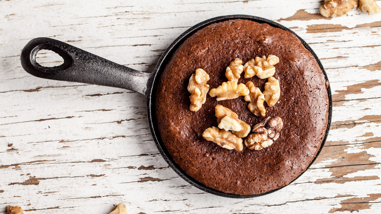 Mini cast iron skillet with brownie and nuts