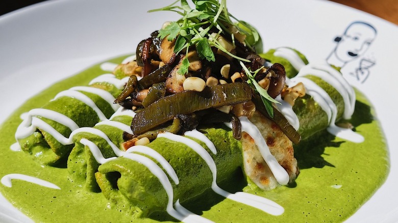 Plate of chicken poblano enchiladas