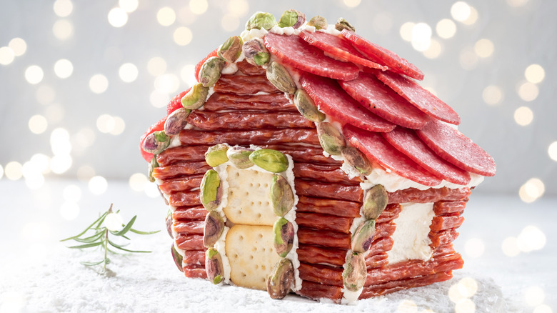Charcuterie chalet with meat and nuts