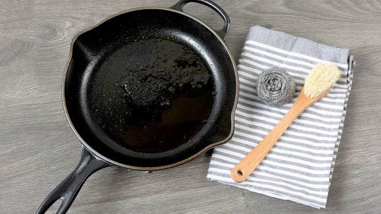 Cast iron pan and cleaning tools