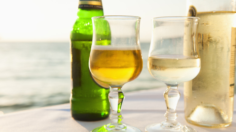 white wine and beer in glasses