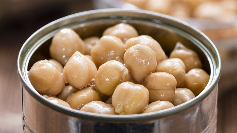 closeup on open can of chickpeas