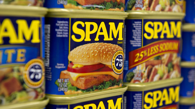 shelf of SPAM cans