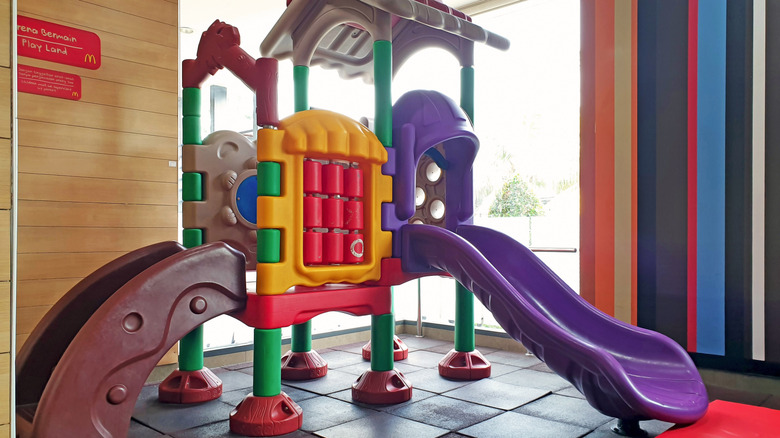 A view of a McDonald's PlayPlace from inside of the restaurant