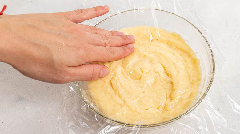 covering pastry cream with plastic