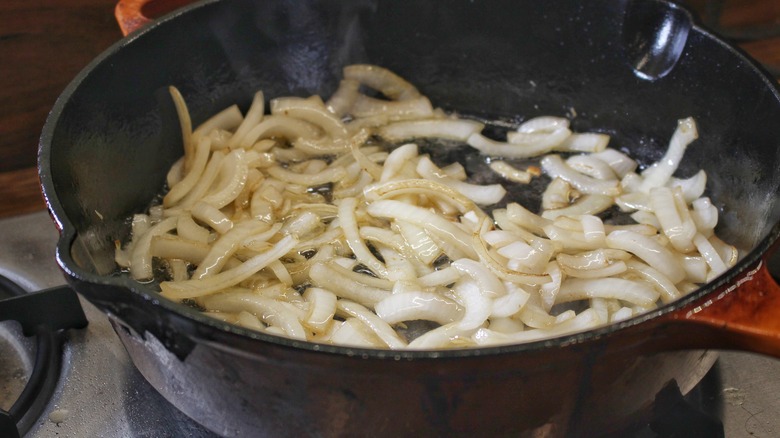 sliced onions in pan