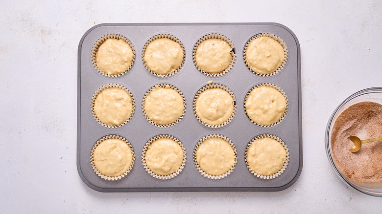 muffin batter in muffin tin