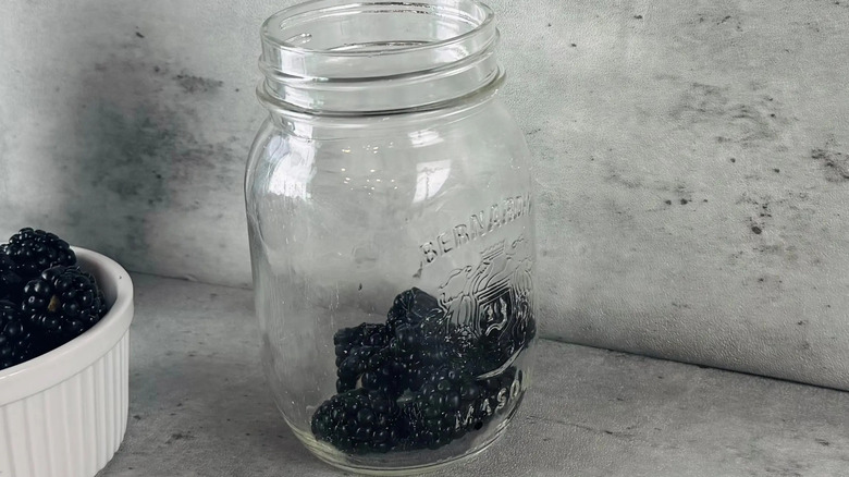 Blackberries in glass jar