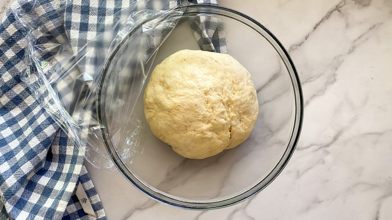 dough in glass bowl