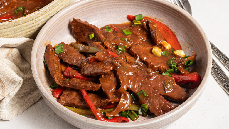 Plate with pepper steak in a brown sauce