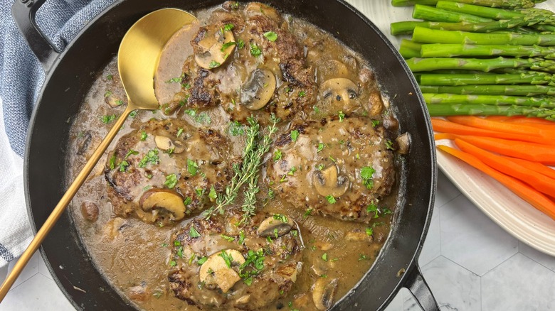 salisbury steak with mushrooms dish in skillet