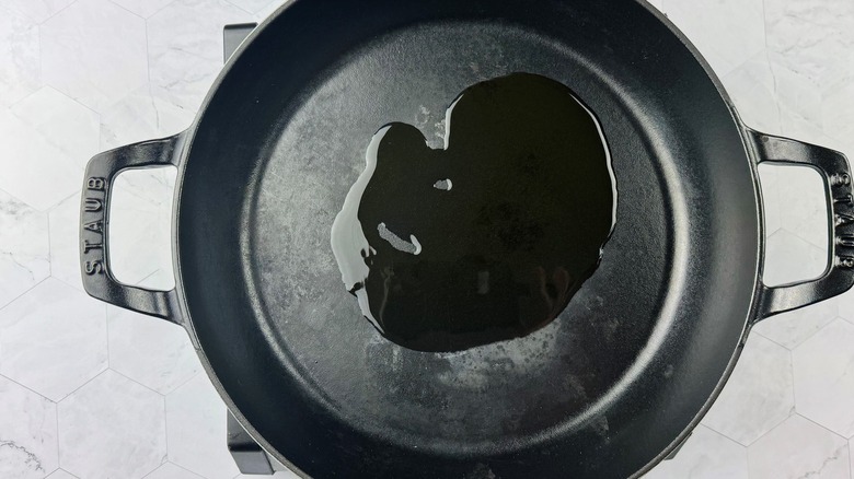 oil heating in cast iron skillet