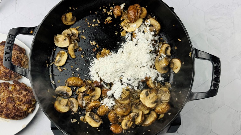 sauteed mushrooms with flour in skillet