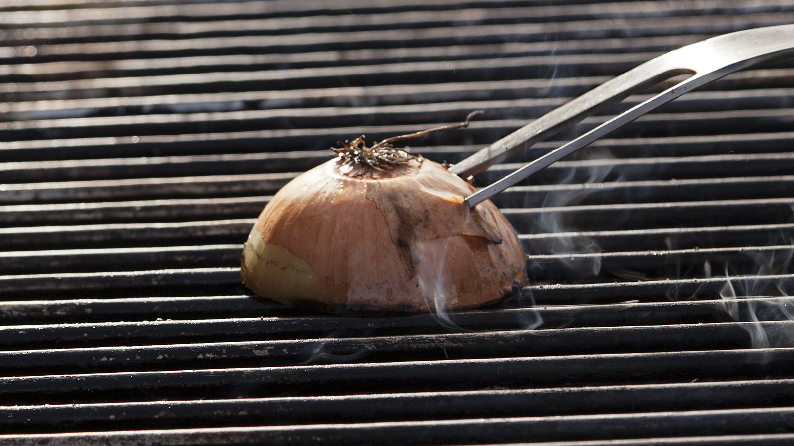 Clean Your Grill Grates With An Onion And Thank Us Later