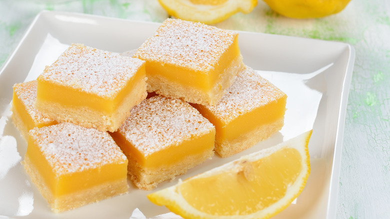 lemon bars on white plate