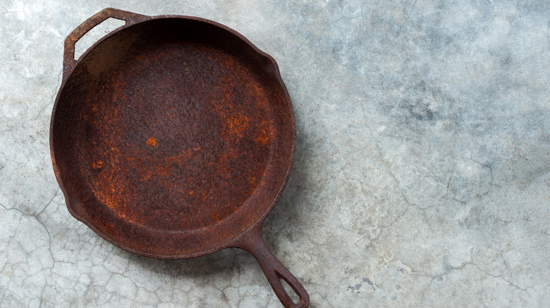 A rusty cast iron pan