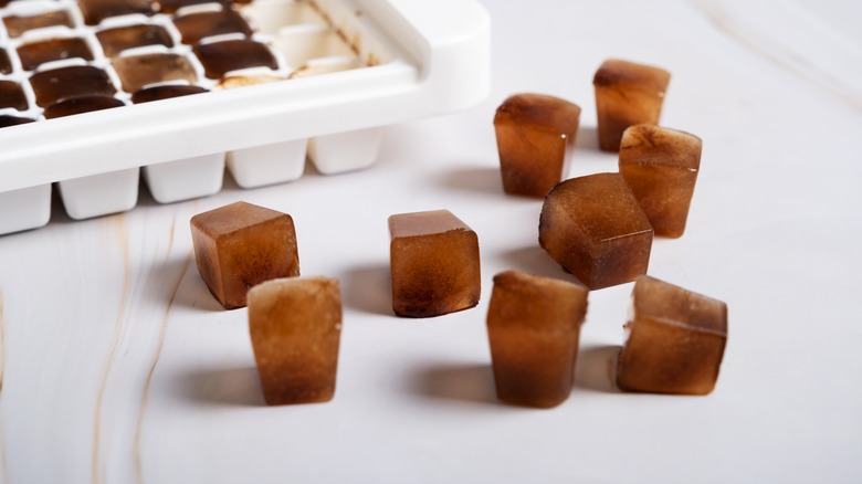 coffee ice cube in tray and on counter