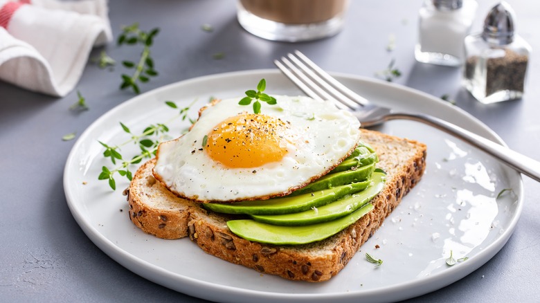 Fried egg, avocado, and toast