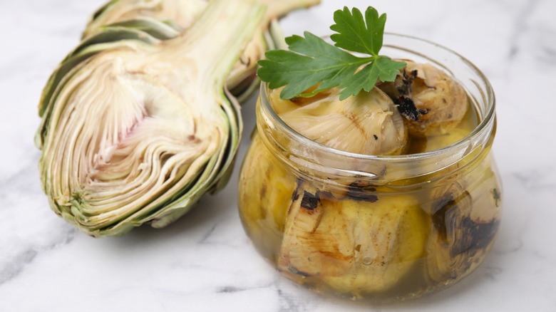 Canned artichoke in glass jar