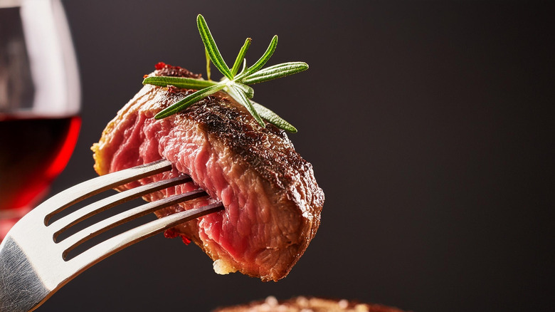 Steak, seasoned with rosemary