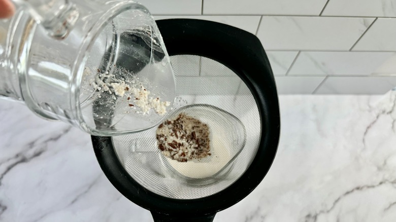 ground rice in strainer