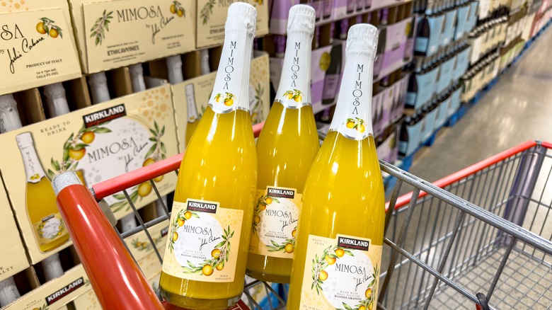 Kirkland brand mimosa bottles in Costco shopping cart