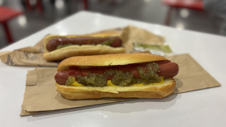 Costco hot dog in focus on table