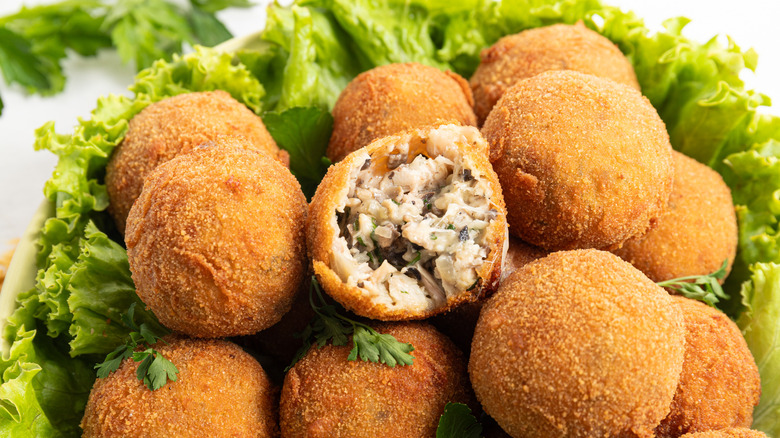 Turkey croquettes on bed of lettuce