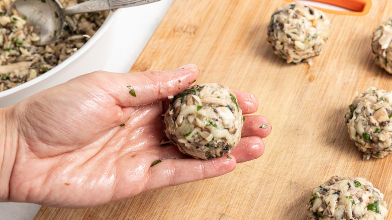 hand shaping turkey croquettes