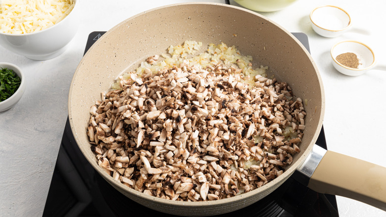 mushrooms and onion in pan