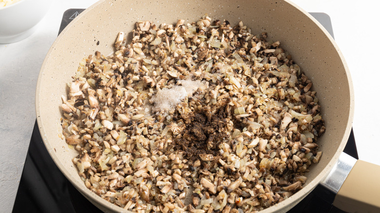 mushrooms and onion in pan